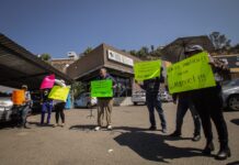 Migrantes protestan en la CEDHBC por falta de atención a víctima de tortura y agresión sexual